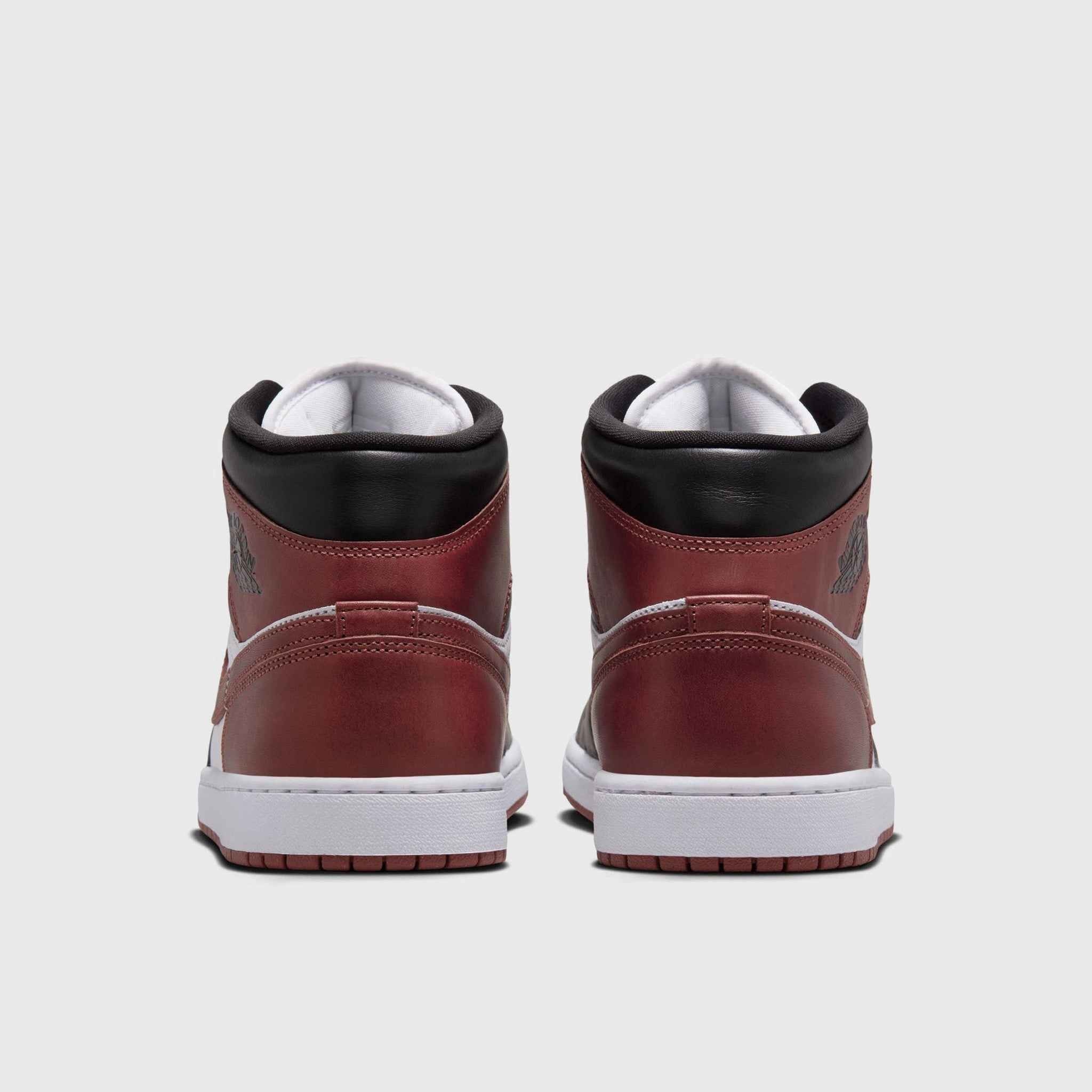 Jordan 1 Mid SE White / Dark Pony - Black