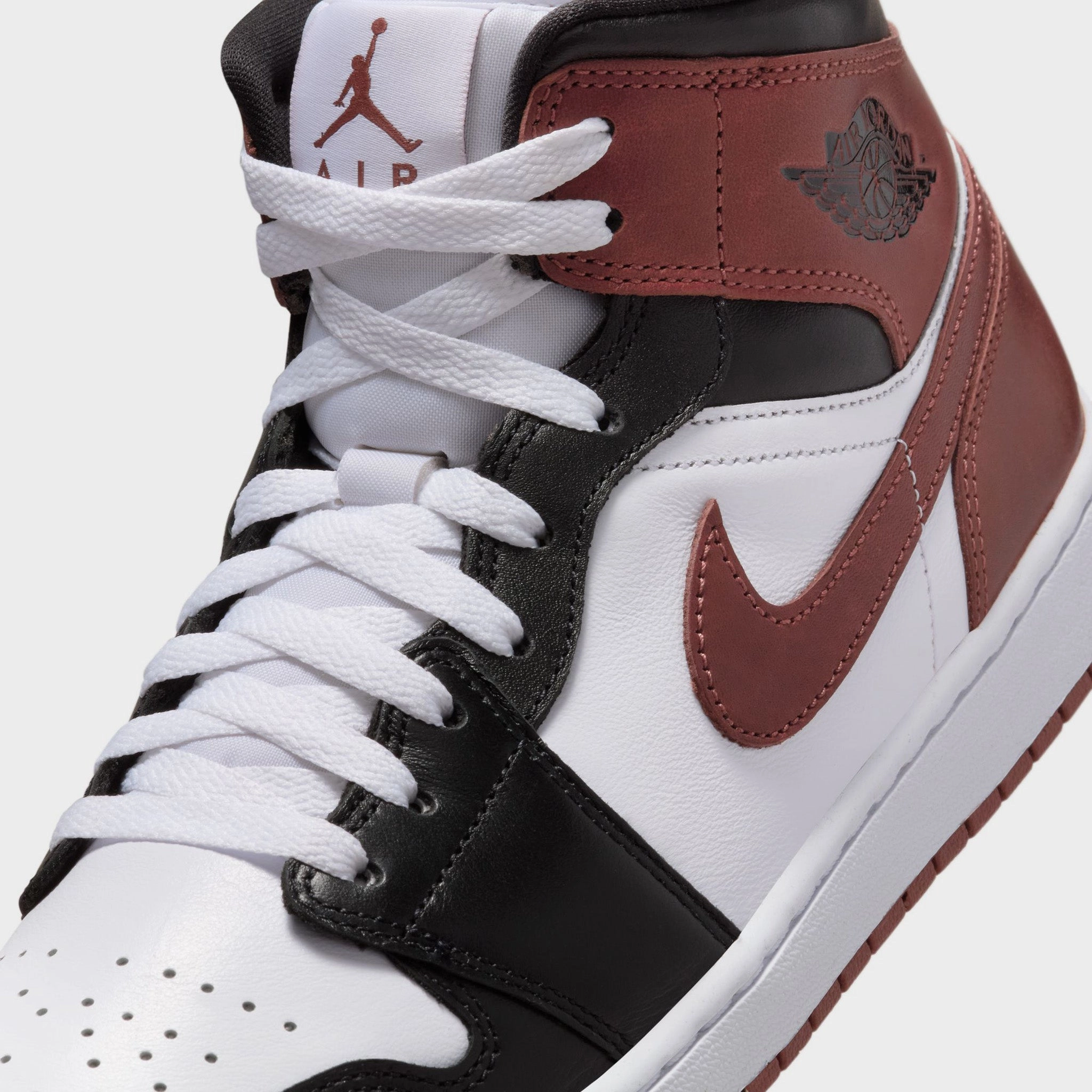 Jordan 1 Mid SE White / Dark Pony - Black